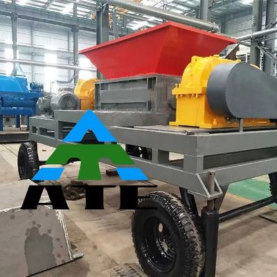 Déchiqueteuse à double arbre de 30 kW pour le déchiquettage des déchets de plastique dans les usines de recyclage de pneus